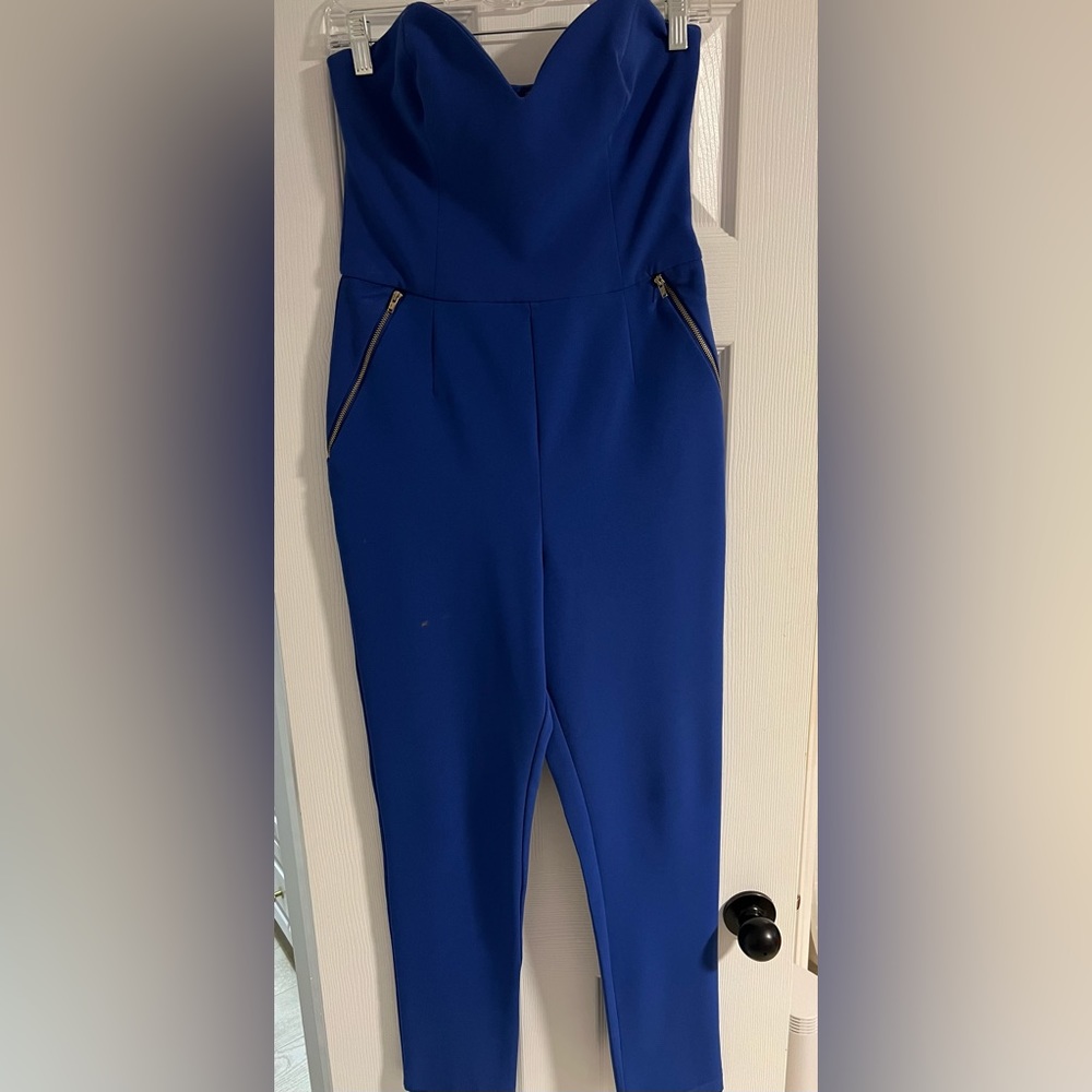 Fun cobalt blue jumpsuit - sweetheart neckline with gold hardware.